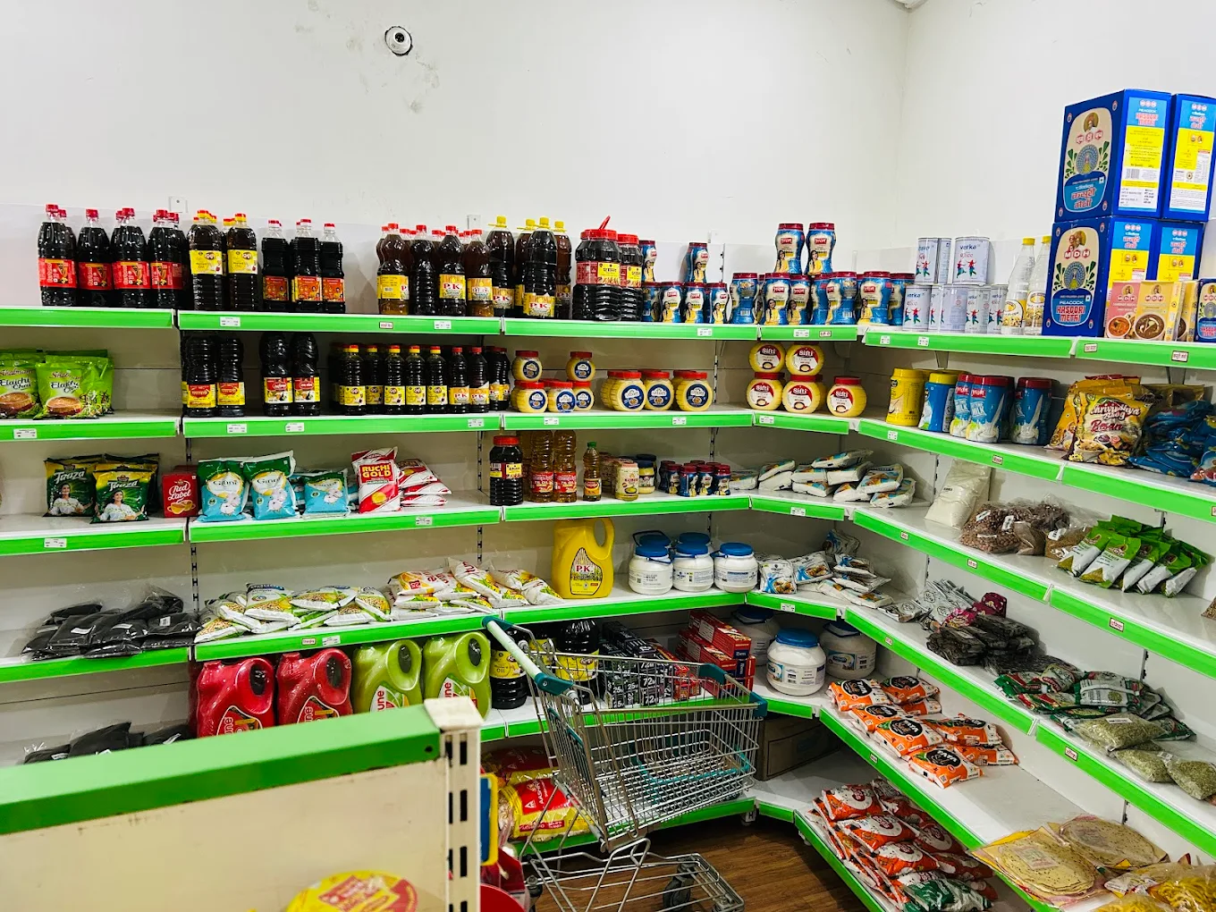 Kirana and grocery section inside Khalsa S-Mart with rice, pulses and spices